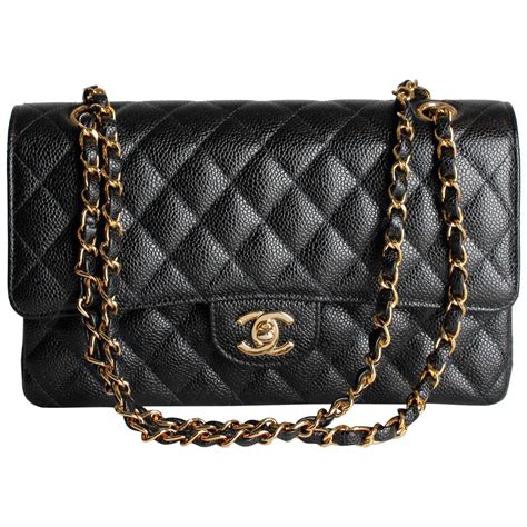 black and gold chanel handbag|Chanel classic black bag price.